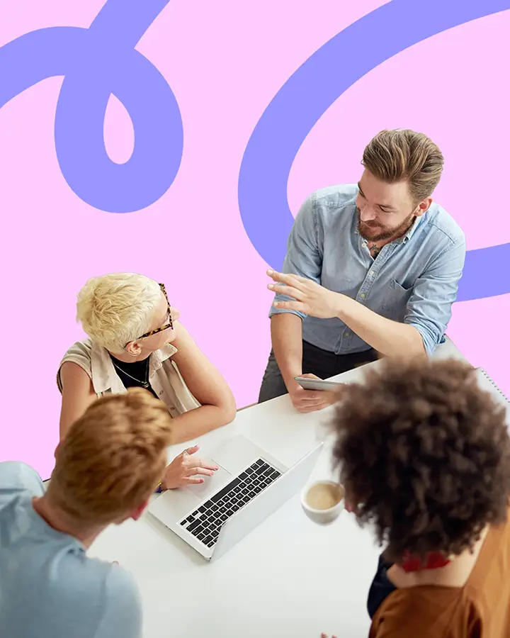 A hiring team reviewing candidates together