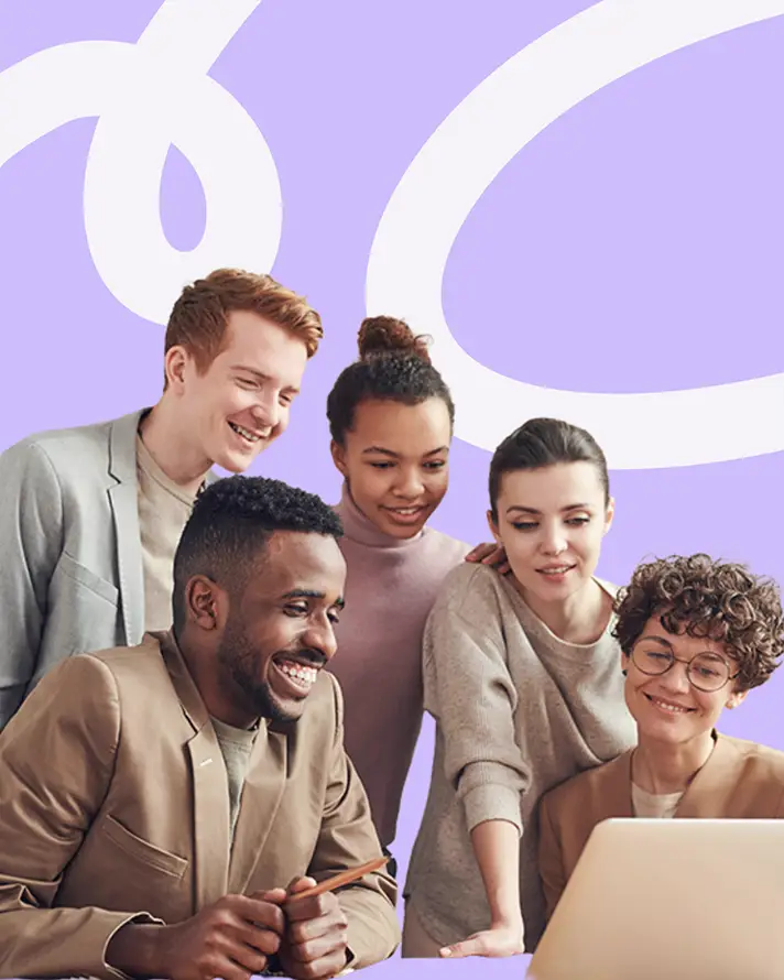 Hiring team collaborating around a laptop